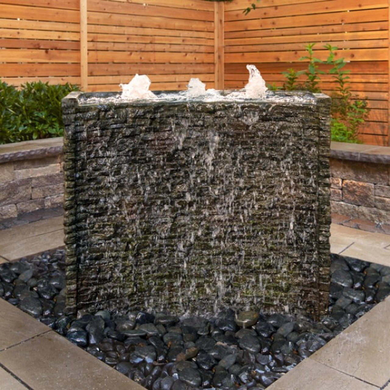 Stone wall spillway fountain