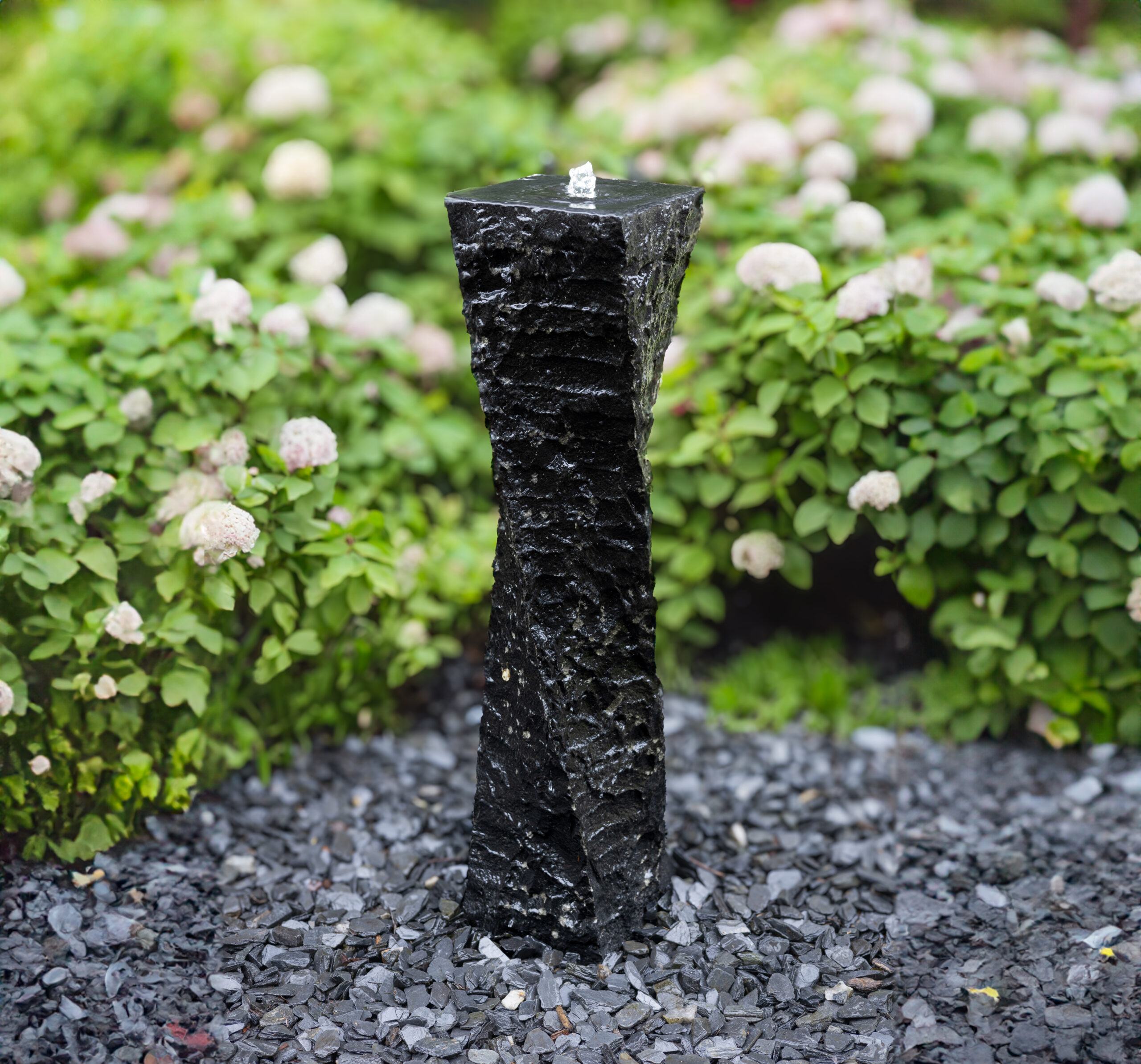 Twisted basalt natural stone fountain