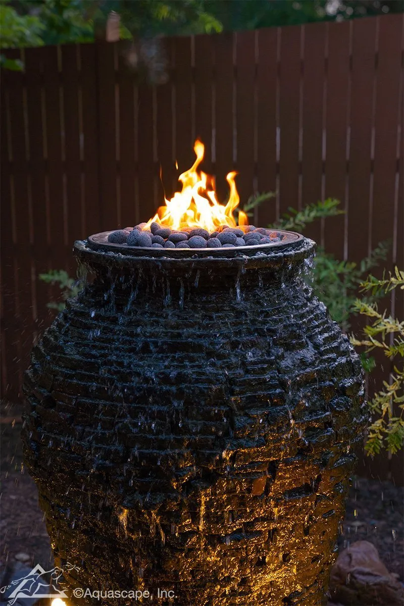 Fire and water stacked slate urn at night